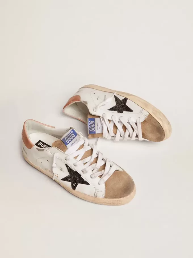 Super-Star da donna con stella glitterata nera e linguetta rosa sul tallone