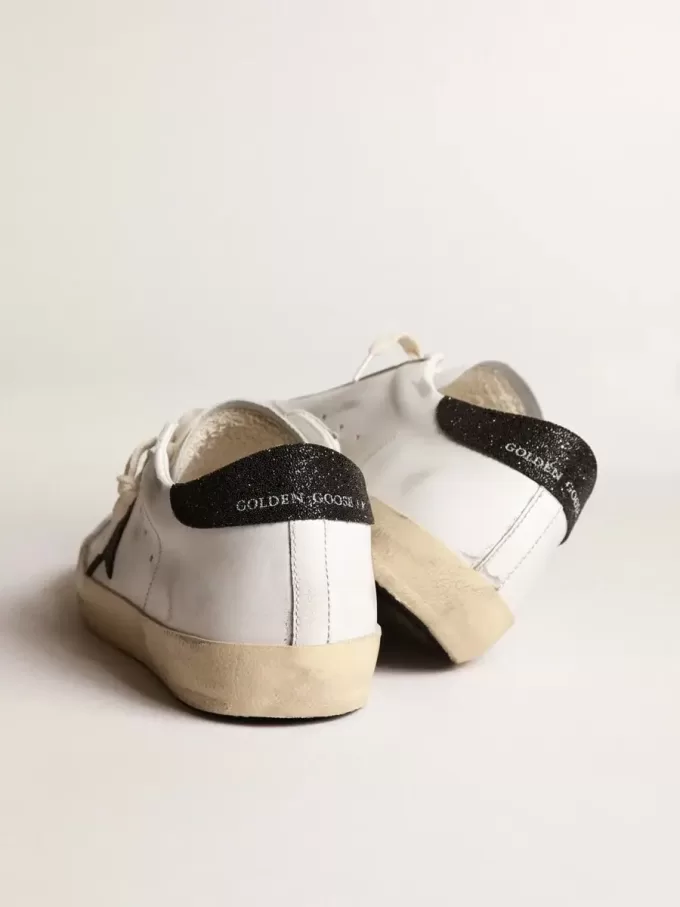 Super-Star da donna con stella in cristallo Swarovski nero e linguetta sul tallone