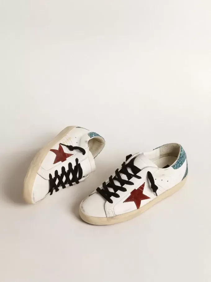 Super-Star da donna con stella in pelle scamosciata bordeaux e linguetta sul tallone con glitter azzurri