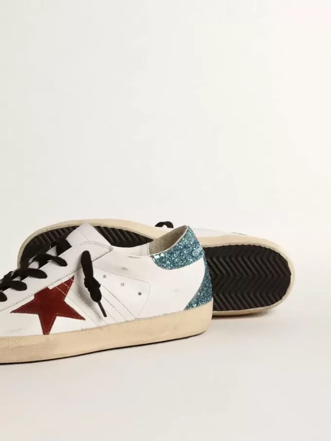 Super-Star da donna con stella in pelle scamosciata bordeaux e linguetta sul tallone con glitter azzurri