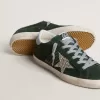 Super-Star da donna in camoscio verde, stella glitterata argento e linguetta in pelle sul tallone Super-Star da donna in camoscio verde, stella glitterata argento e linguetta in pelle sul tallone