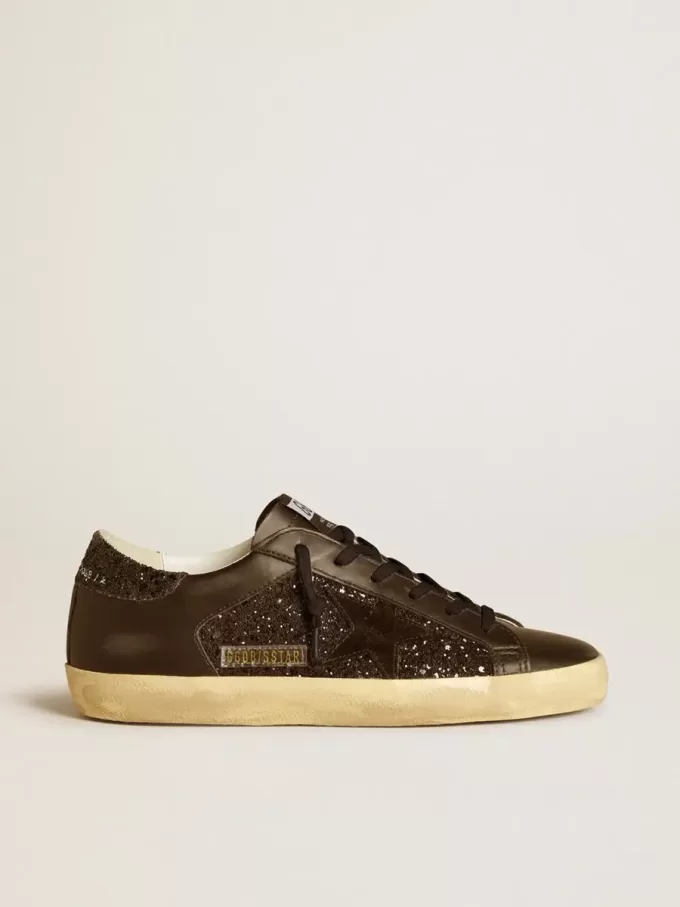 Super-Star da donna in glitter nero con stella in camoscio nero e inserti in pelle Super-Star da donna in glitter nero con stella in camoscio nero e inserti in pelle