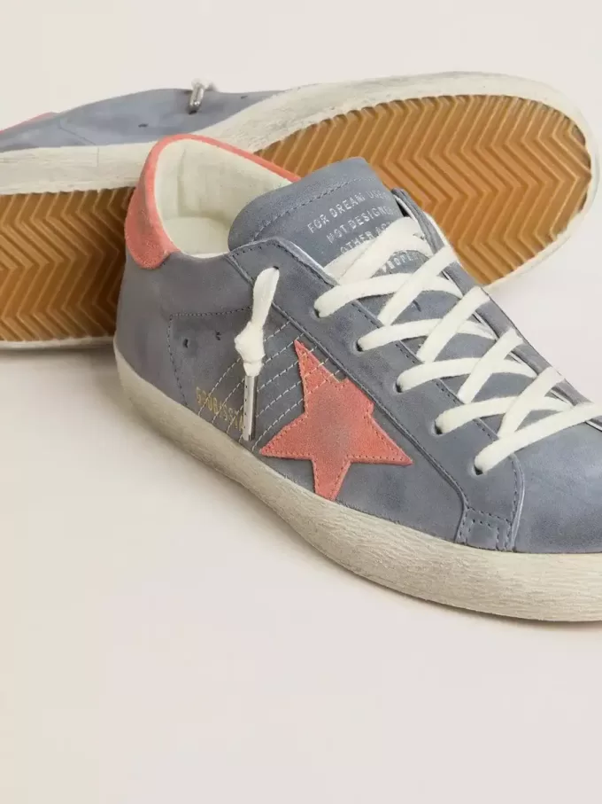 Super Star da donna in nabuk blu con stella e linguetta sul tallone in pelle scamosciata rosa