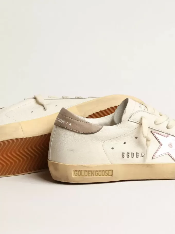 Super-Star da donna in nappa bianca con stella in pelle metallizzata rosa
