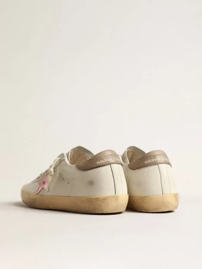 Super-Star da donna in nappa bianca con stella in pelle metallizzata rosa