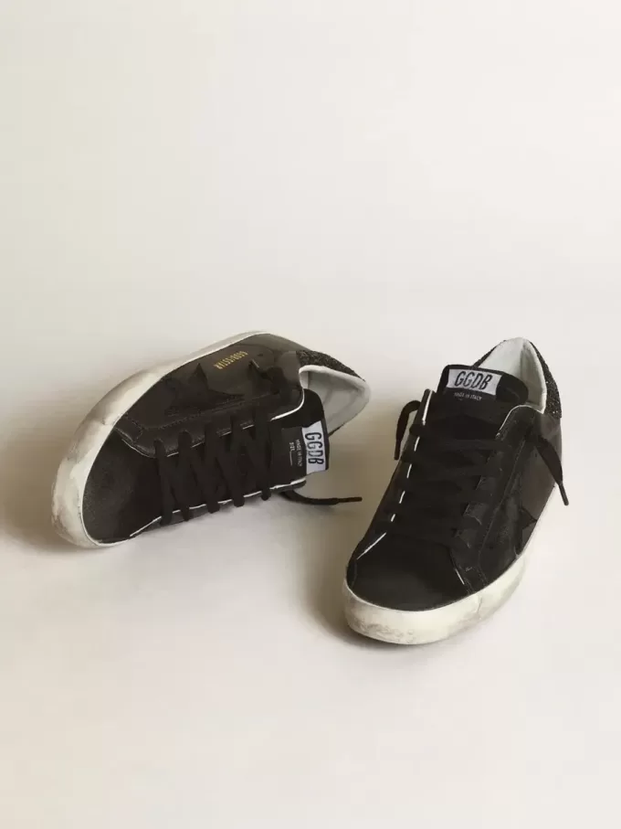 Super-Star da donna in nappa nera con stella nera e tallone glitterato