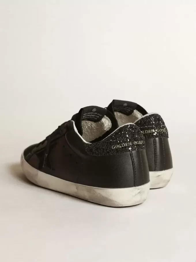 Super-Star da donna in nappa nera con stella nera e tallone glitterato