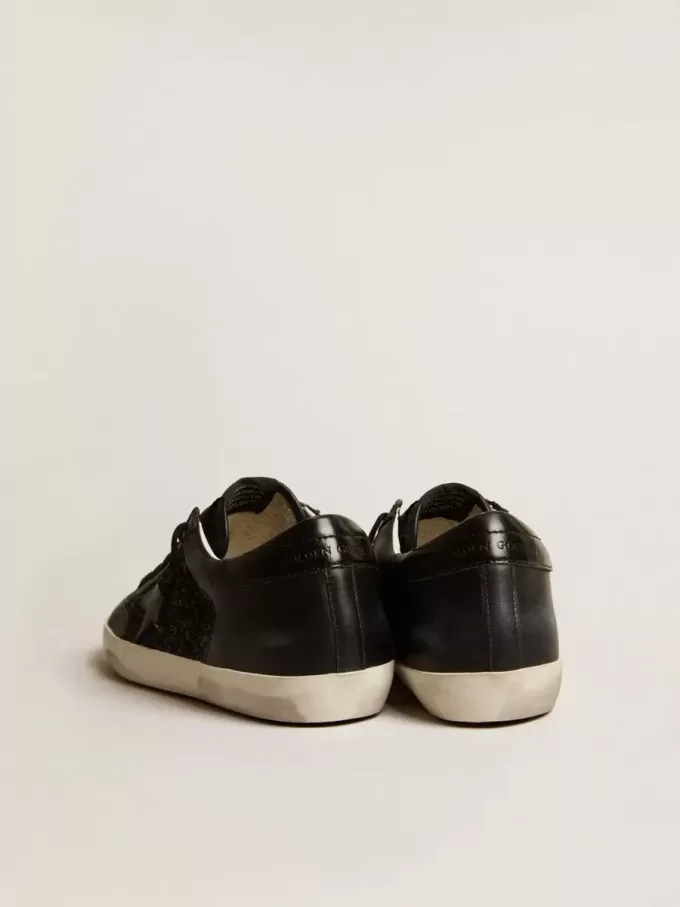 Super-Star da donna in nappa nera e glitter con stella in pelle nera lucida
