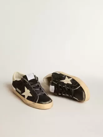 Super-Star da donna in nero glitterato e nappa con stella e tallone in pelle color crema