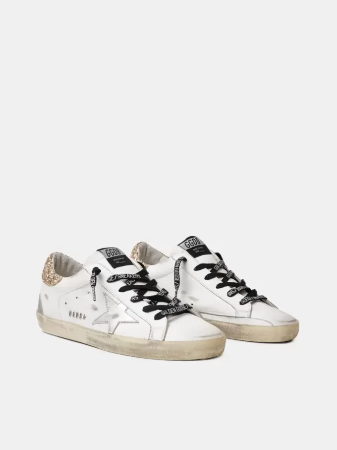 Super-Star da donna in pelle bianca con tallone glitterato Super-Star da donna in pelle bianca con tallone glitterato
