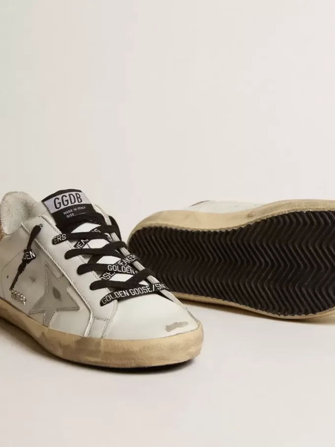 Super-Star da donna in pelle bianca con tallone glitterato Super-Star da donna in pelle bianca con tallone glitterato