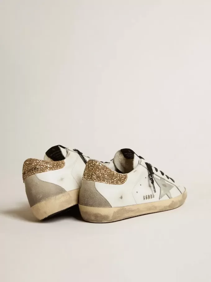Super-Star da donna in pelle bianca con tallone glitterato Super-Star da donna in pelle bianca con tallone glitterato