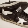 Super-Star da donna in pelle nera con stella e linguetta sul tallone in pelle bianca Super-Star da donna in pelle nera con stella e linguetta sul tallone in pelle bianca