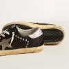 Super-Star da donna in pelle nera e camoscio con borchie argentate