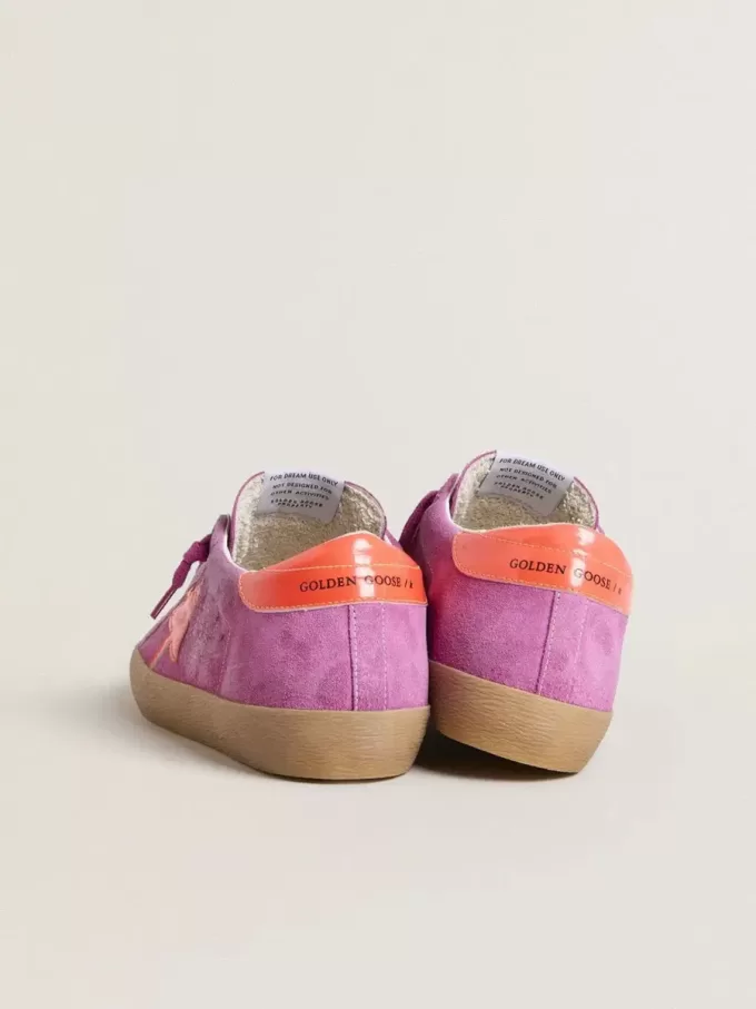 Super-Star da donna in pelle scamosciata fucsia con stella e tallone in pelle laminata arancione fluorescente Super-Star da donna in pelle scamosciata fucsia con stella e tallone in pelle laminata arancione fluorescente