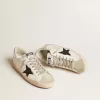 Super-Star da uomo in pelle bianca con stella in nabuk nero e linguetta sul tallone in pelle metallizzata argento Super-Star da uomo in pelle bianca con stella in nabuk nero e linguetta sul tallone in pelle metallizzata argento