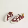 Super-Star da uomo in pelle scamosciata rosso mattone con stella in pelle bianca e linguetta sul tallone con stampa animalier Super-Star da uomo in pelle scamosciata rosso mattone con stella in pelle bianca e linguetta sul tallone con stampa animalier