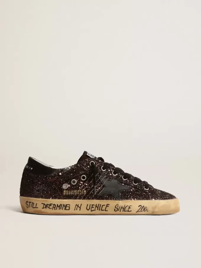 Super-Star in marrone glitterato con stella e linguetta sul tallone in pelle nera Super-Star in marrone glitterato con stella e linguetta sul tallone in pelle nera
