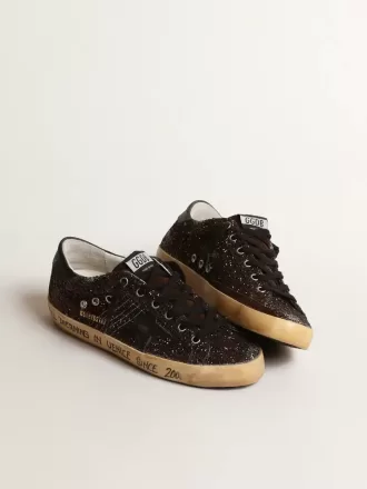 Super-Star in marrone glitterato con stella e linguetta sul tallone in pelle nera Super-Star in marrone glitterato con stella e linguetta sul tallone in pelle nera