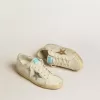 Super-Star in pelle bianca e camoscio con stella in pelle argento e oro Super-Star in pelle bianca e camoscio con stella in pelle argento e oro
