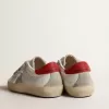 Super-Star Junior con stella in pelle scamosciata e linguetta sul tallone in pelle rossa Super-Star Junior con stella in pelle scamosciata e linguetta sul tallone in pelle rossa