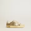 Super-Star Junior in glitter dorato con stella e linguetta sul tallone in pelle bianca