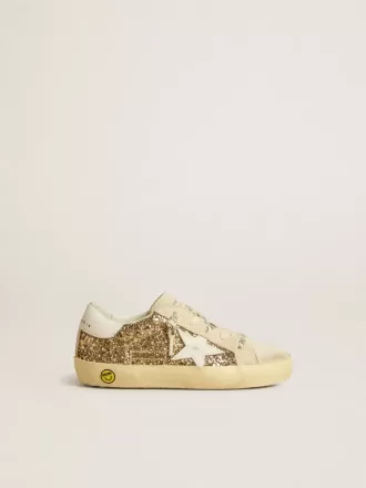 Super-Star Junior in glitter dorato con stella e linguetta sul tallone in pelle bianca