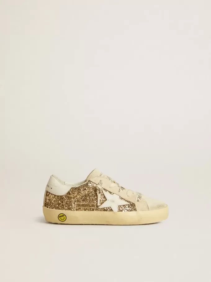 Super-Star Junior in glitter dorato con stella e linguetta sul tallone in pelle bianca