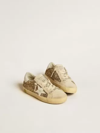 Super-Star Junior in glitter dorato con stella e linguetta sul tallone in pelle bianca