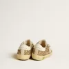 Super-Star Junior in glitter dorato con stella e linguetta sul tallone in pelle bianca