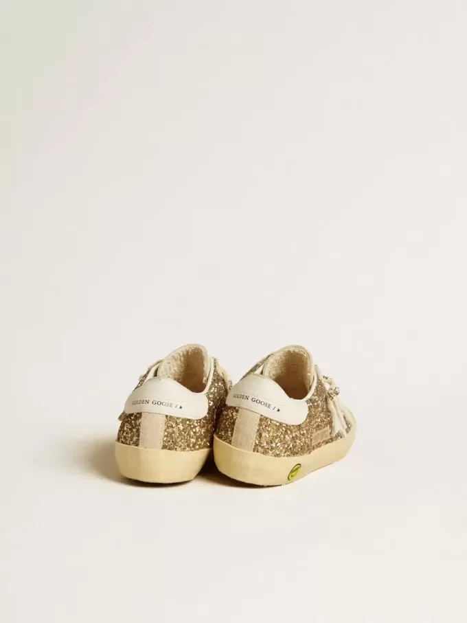 Super-Star Junior in glitter dorato con stella e linguetta sul tallone in pelle bianca