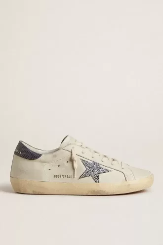 Super-Star LTD con stella in pelle color crema con cristalli Swarovski e linguetta sul tallone in pelle blu con stampa lucertola Super-Star LTD con stella in pelle color crema con cristalli Swarovski e linguetta sul tallone in pelle blu con stampa lucertola