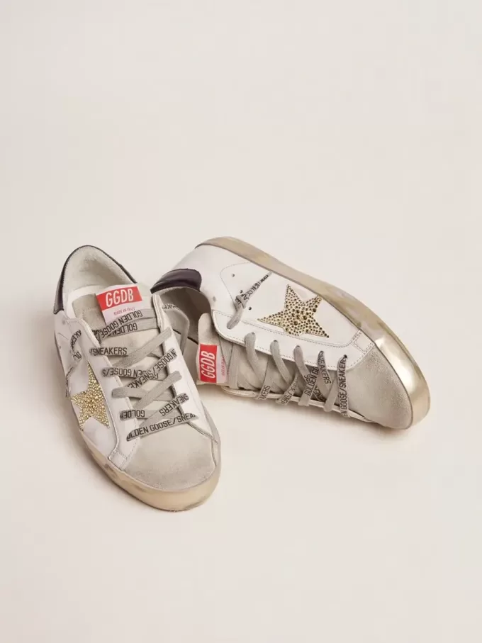 Super-Star LTD da donna con linguetta blu sul tallone e stella in cristallo Swarovski Super-Star LTD da donna con linguetta blu sul tallone e stella in cristallo Swarovski