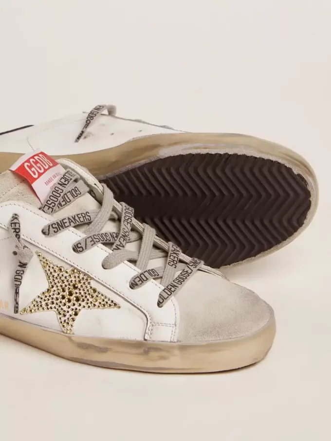 Super-Star LTD da donna con linguetta blu sul tallone e stella in cristallo Swarovski Super-Star LTD da donna con linguetta blu sul tallone e stella in cristallo Swarovski