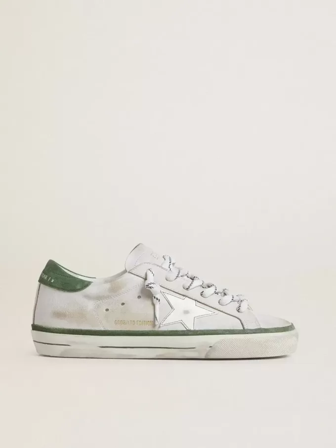 Super-Star LTD da donna con stella in pelle bianca e linguetta sul tallone in pelle scamosciata verde Super-Star LTD da donna con stella in pelle bianca e linguetta sul tallone in pelle scamosciata verde