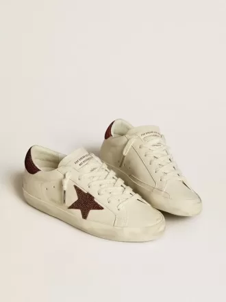 Super-Star LTD da donna con stella in pelle scamosciata e linguetta sul tallone con cristalli Swarovski Super-Star LTD da donna con stella in pelle scamosciata e linguetta sul tallone con cristalli Swarovski