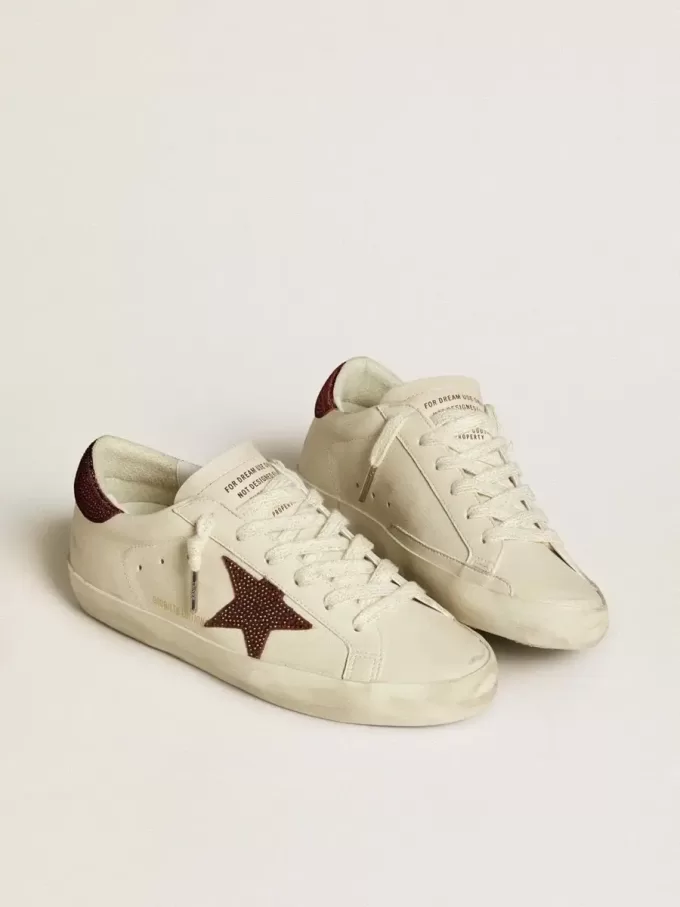 Super-Star LTD da donna con stella in pelle scamosciata e linguetta sul tallone con cristalli Swarovski Super-Star LTD da donna con stella in pelle scamosciata e linguetta sul tallone con cristalli Swarovski
