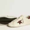 Super-Star LTD da donna con stella in pelle scamosciata e linguetta sul tallone con cristalli Swarovski Super-Star LTD da donna con stella in pelle scamosciata e linguetta sul tallone con cristalli Swarovski