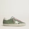 Super-Star LTD da donna in nabuk verde con stella e linguetta sul tallone in pelle bianca Super-Star LTD da donna in nabuk verde con stella e linguetta sul tallone in pelle bianca