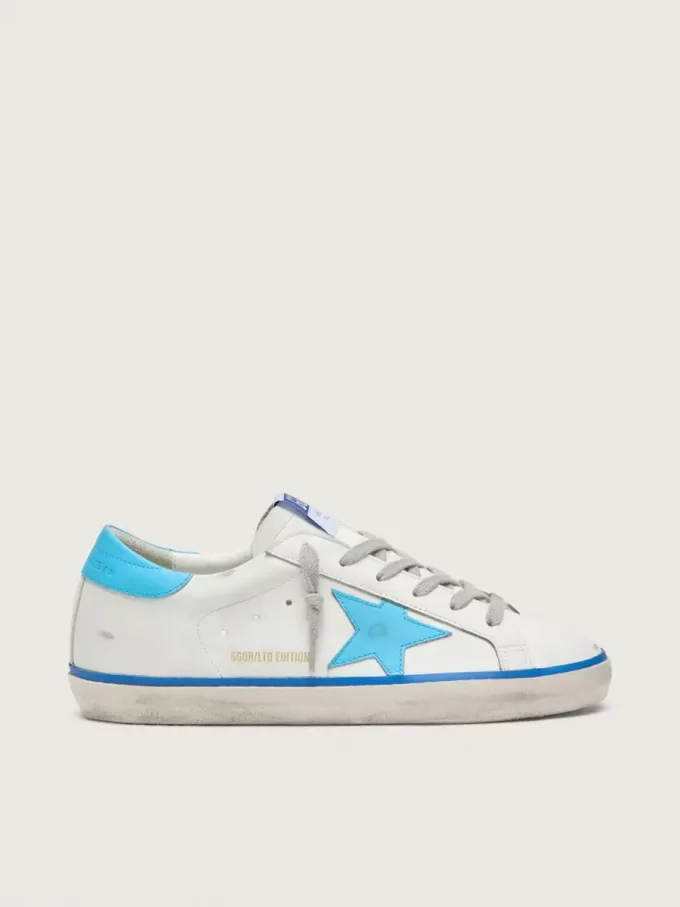 Super-Star LTD da donna in pelle bianca con stella e linguetta sul tallone in pelle azzurra Super-Star LTD da donna in pelle bianca con stella e linguetta sul tallone in pelle azzurra