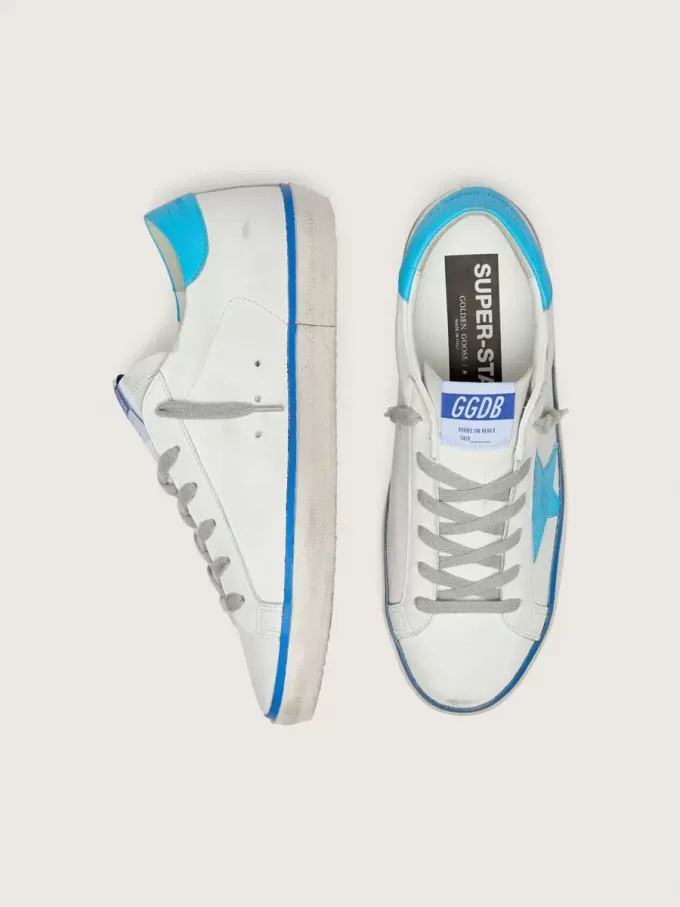 Super-Star LTD da donna in pelle bianca con stella e linguetta sul tallone in pelle azzurra Super-Star LTD da donna in pelle bianca con stella e linguetta sul tallone in pelle azzurra