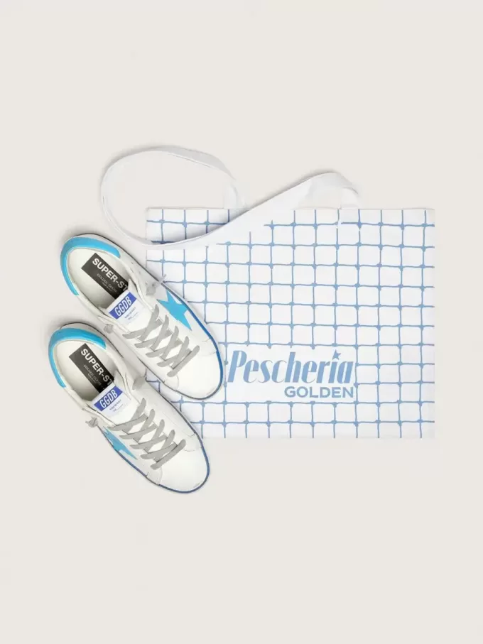 Super-Star LTD da donna in pelle bianca con stella e linguetta sul tallone in pelle azzurra Super-Star LTD da donna in pelle bianca con stella e linguetta sul tallone in pelle azzurra
