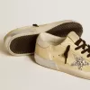 Super-Star LTD da donna in pelle scamosciata con stella glitterata e linguetta in pelle sul tallone