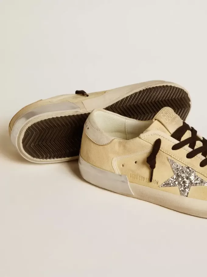 Super-Star LTD da donna in pelle scamosciata con stella glitterata e linguetta in pelle sul tallone