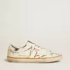 Super-Star LTD da uomo con stella traforata e linguetta sul tallone in pelle metallizzata Super-Star LTD da uomo con stella traforata e linguetta sul tallone in pelle metallizzata