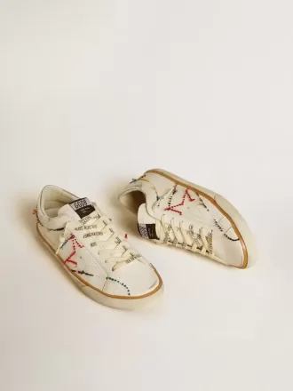 Super-Star LTD da uomo con stella traforata e linguetta sul tallone in pelle metallizzata Super-Star LTD da uomo con stella traforata e linguetta sul tallone in pelle metallizzata