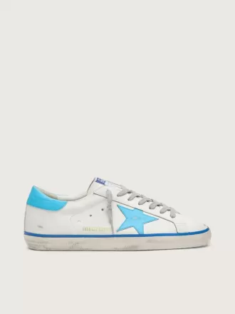 Super-Star LTD da uomo in pelle bianca con stella e linguetta sul tallone in pelle azzurra Super-Star LTD da uomo in pelle bianca con stella e linguetta sul tallone in pelle azzurra