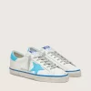 Super-Star LTD da uomo in pelle bianca con stella e linguetta sul tallone in pelle azzurra Super-Star LTD da uomo in pelle bianca con stella e linguetta sul tallone in pelle azzurra