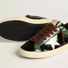 Super-Star LTD da uomo in pelle laminata nera con stella e linguetta sul tallone in pelle bianca Super-Star LTD da uomo in pelle laminata nera con stella e linguetta sul tallone in pelle bianca
