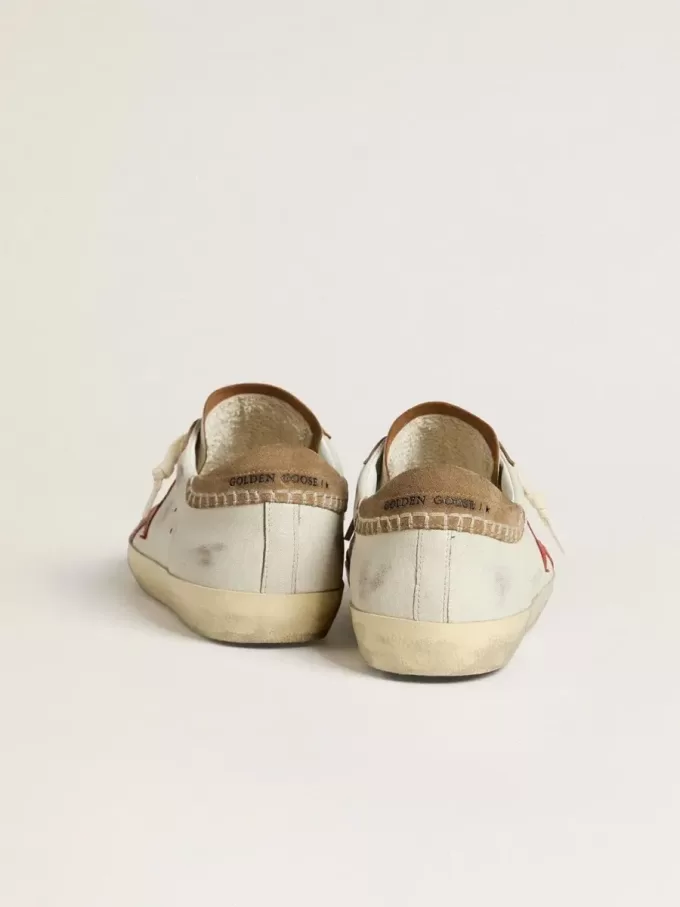 Super-Star LTD da uomo in pelle nappa con stella in pelle arancione e linguetta sul tallone in camoscio tabacco Super-Star LTD da uomo in pelle nappa con stella in pelle arancione e linguetta sul tallone in camoscio tabacco